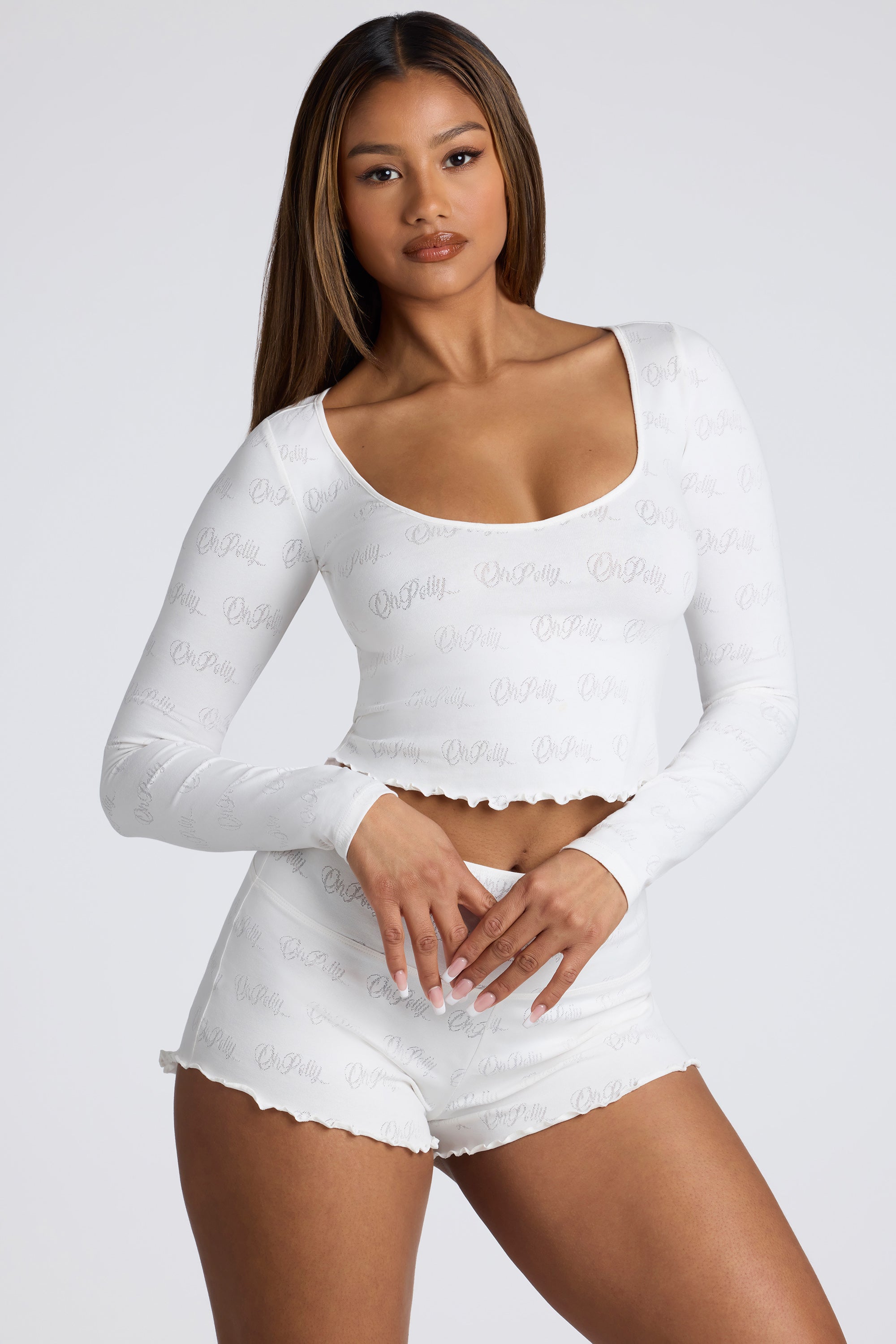 Long Sleeve Scoop Neck Pointelle Crop Top in White