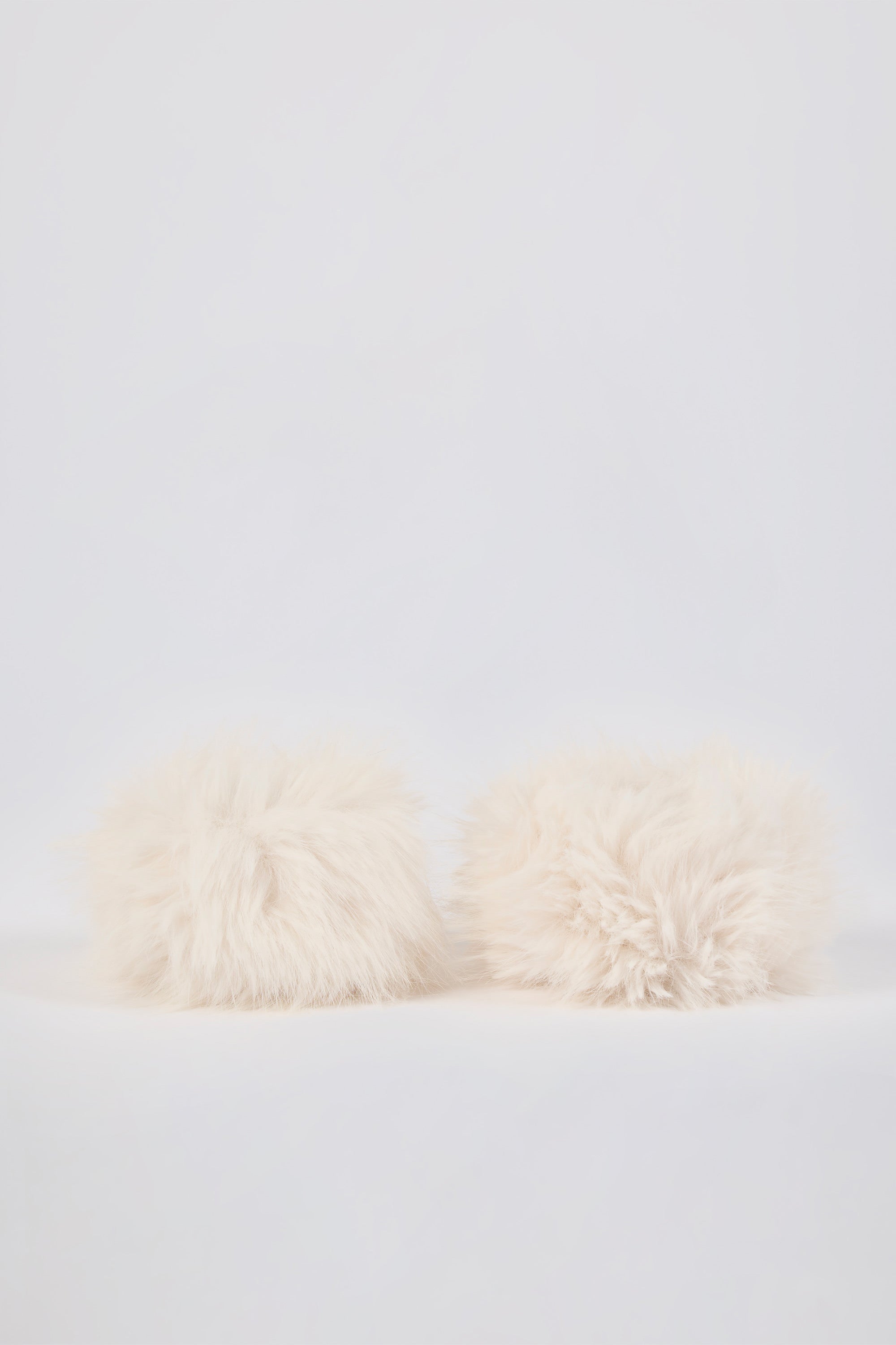 Faux-Fur Wrist Warmers in Ice White