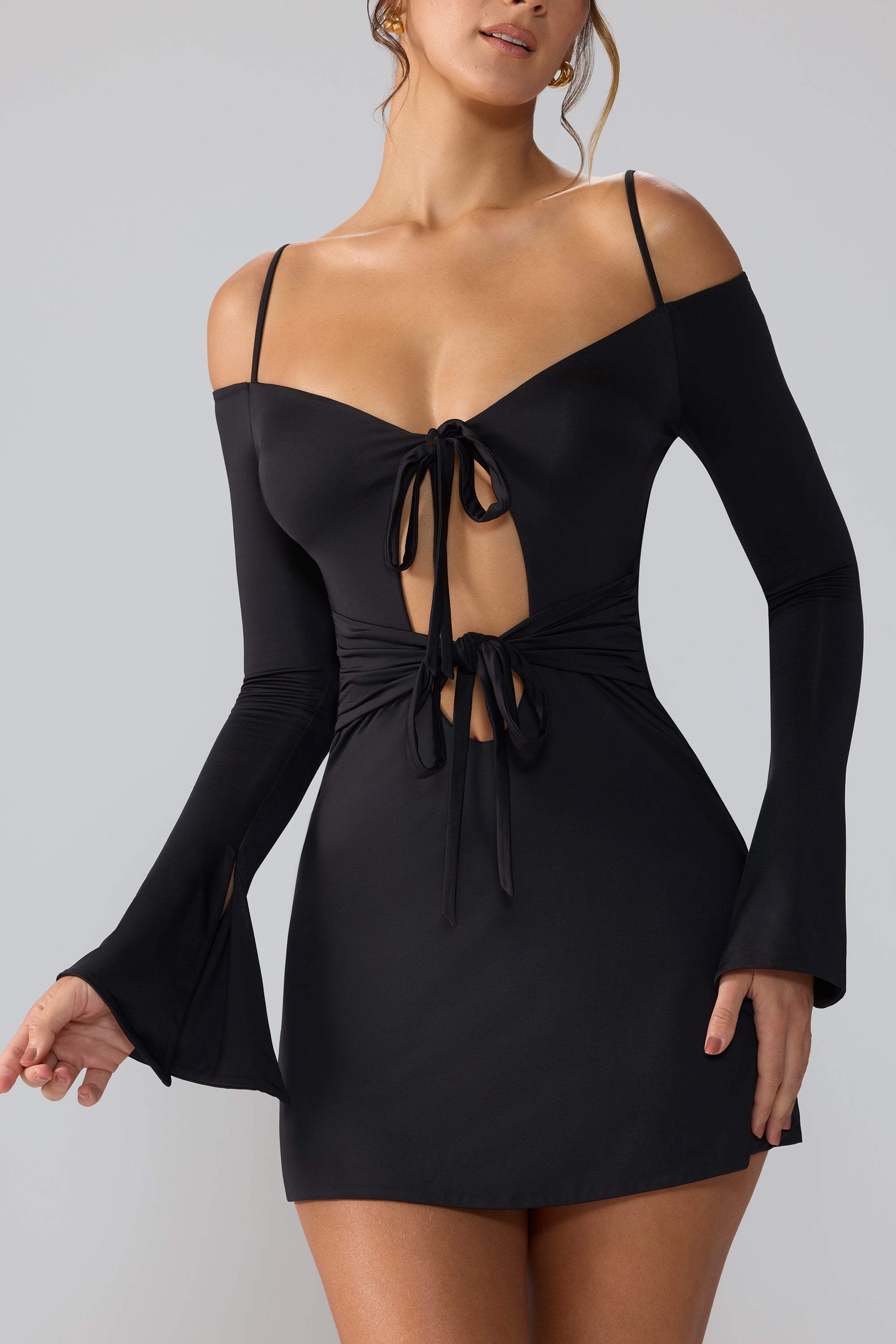 Slinky Jersey Long Sleeve Cut Out Mini Dress in Black