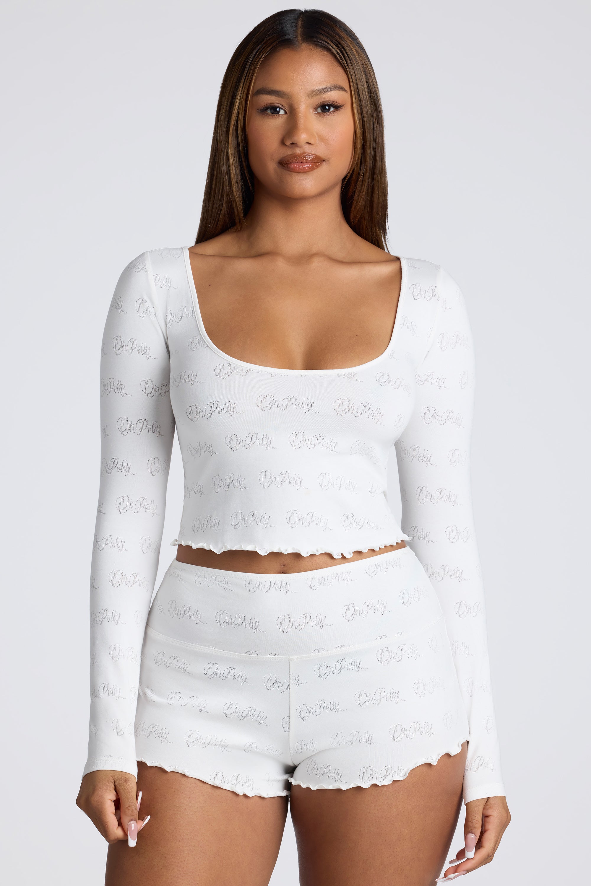 Long Sleeve Scoop Neck Pointelle Crop Top in White