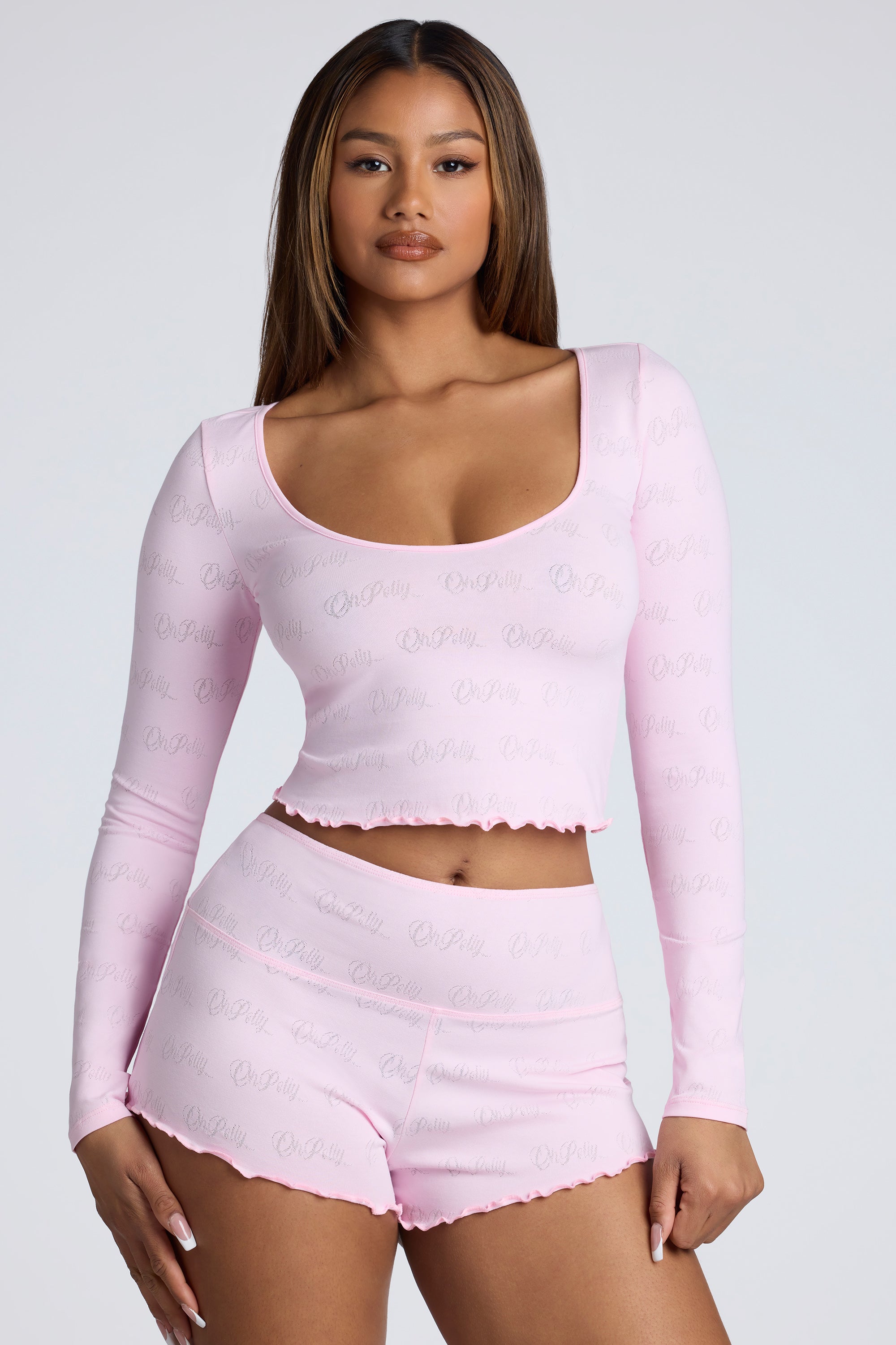 Long Sleeve Scoop Neck Pointelle Crop Top in Baby Pink