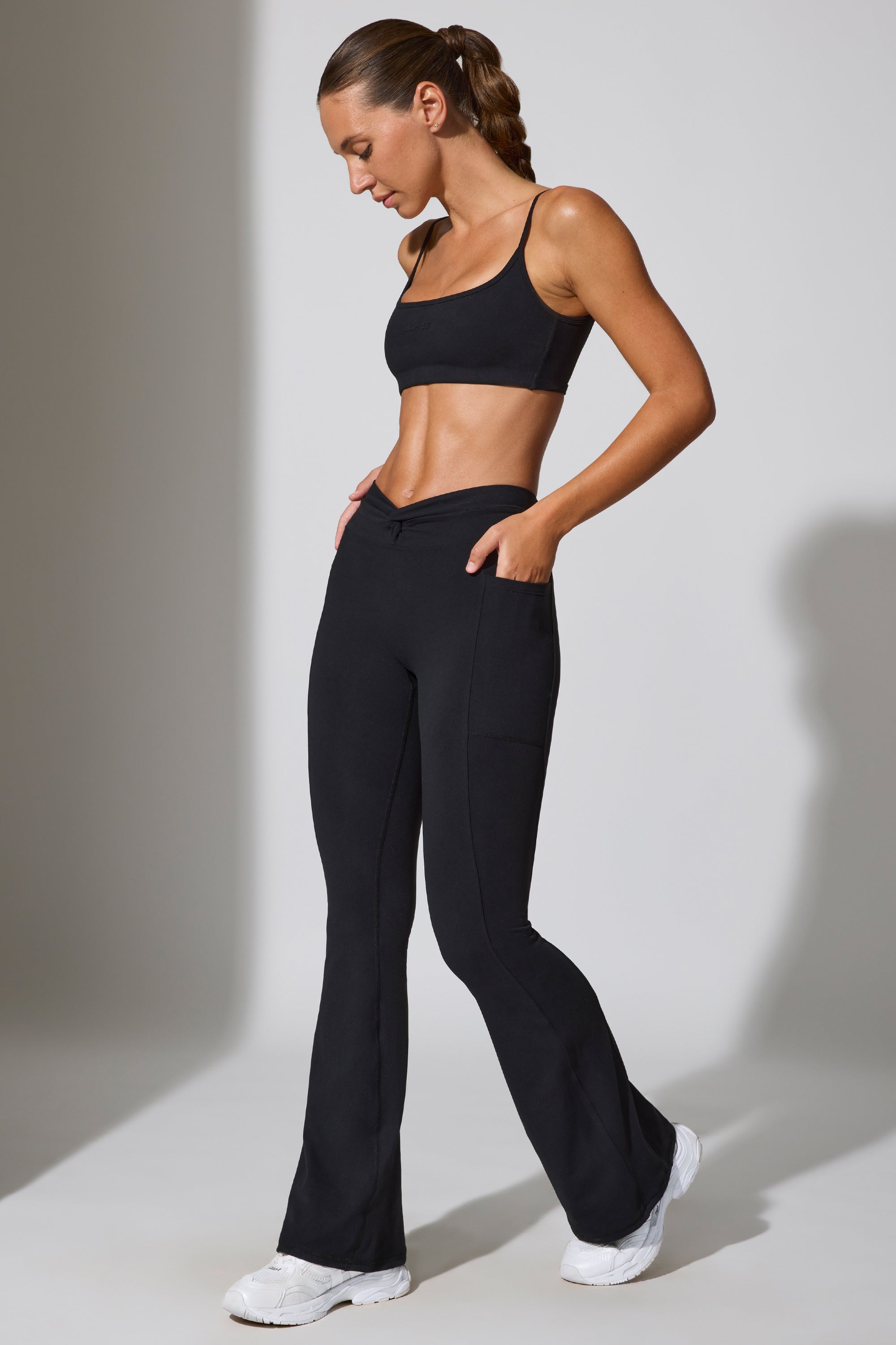 Petite Twist Waist Flare Leggings in Black