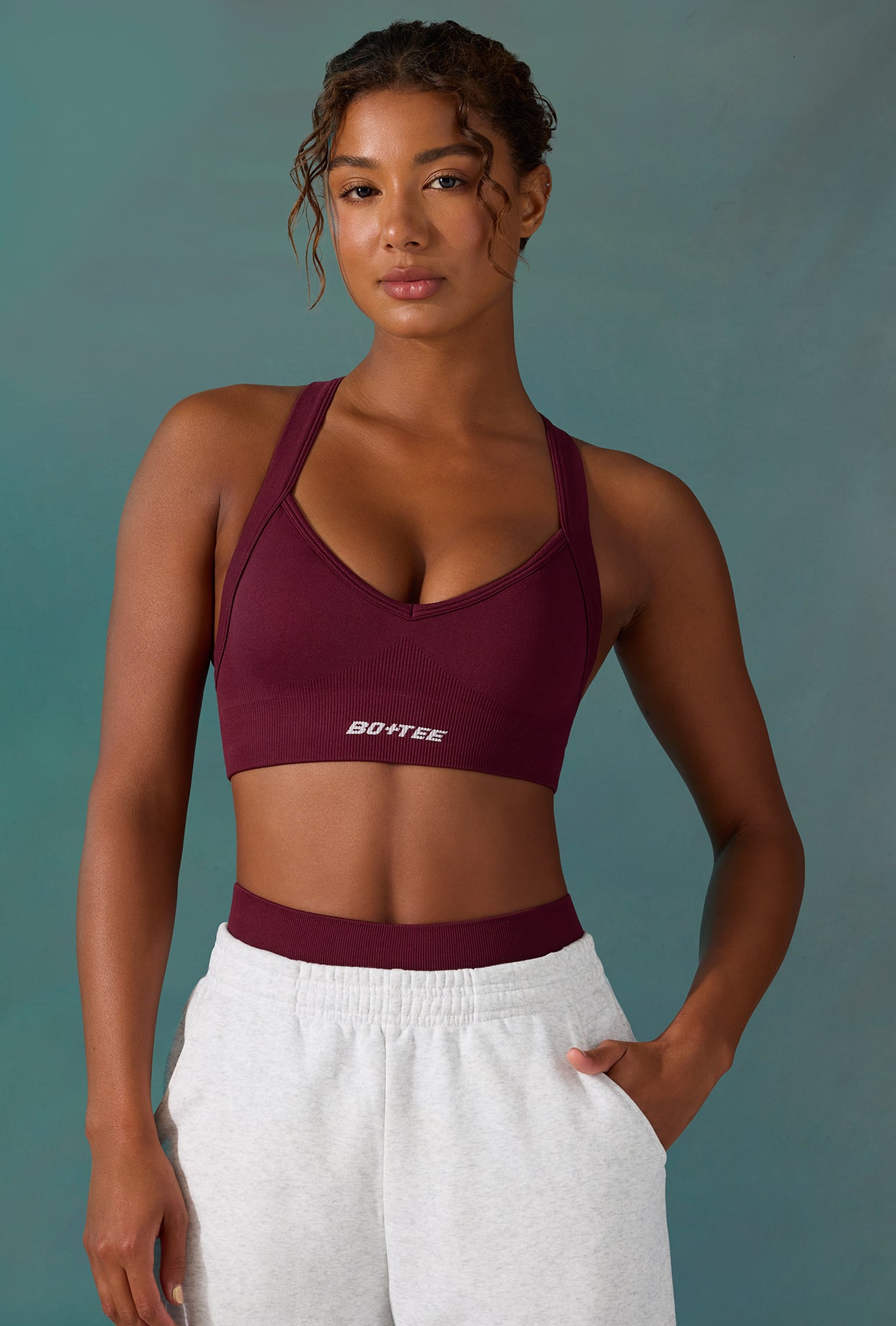 Super Sculpt Seamless Cross Back Sports Bra in Plum