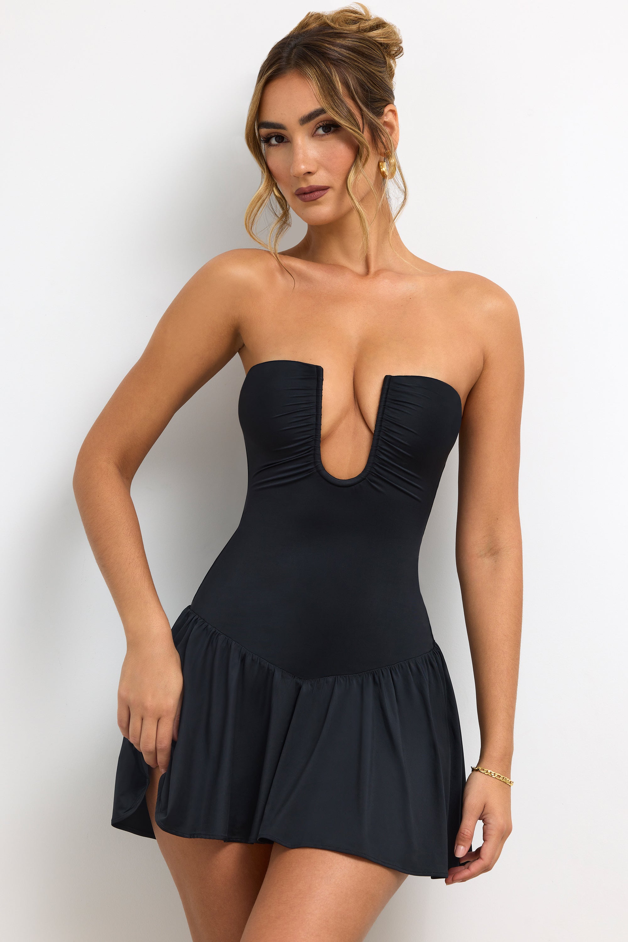 Slinky Jersey Strapless Plunge Neck Mini Dress in Black