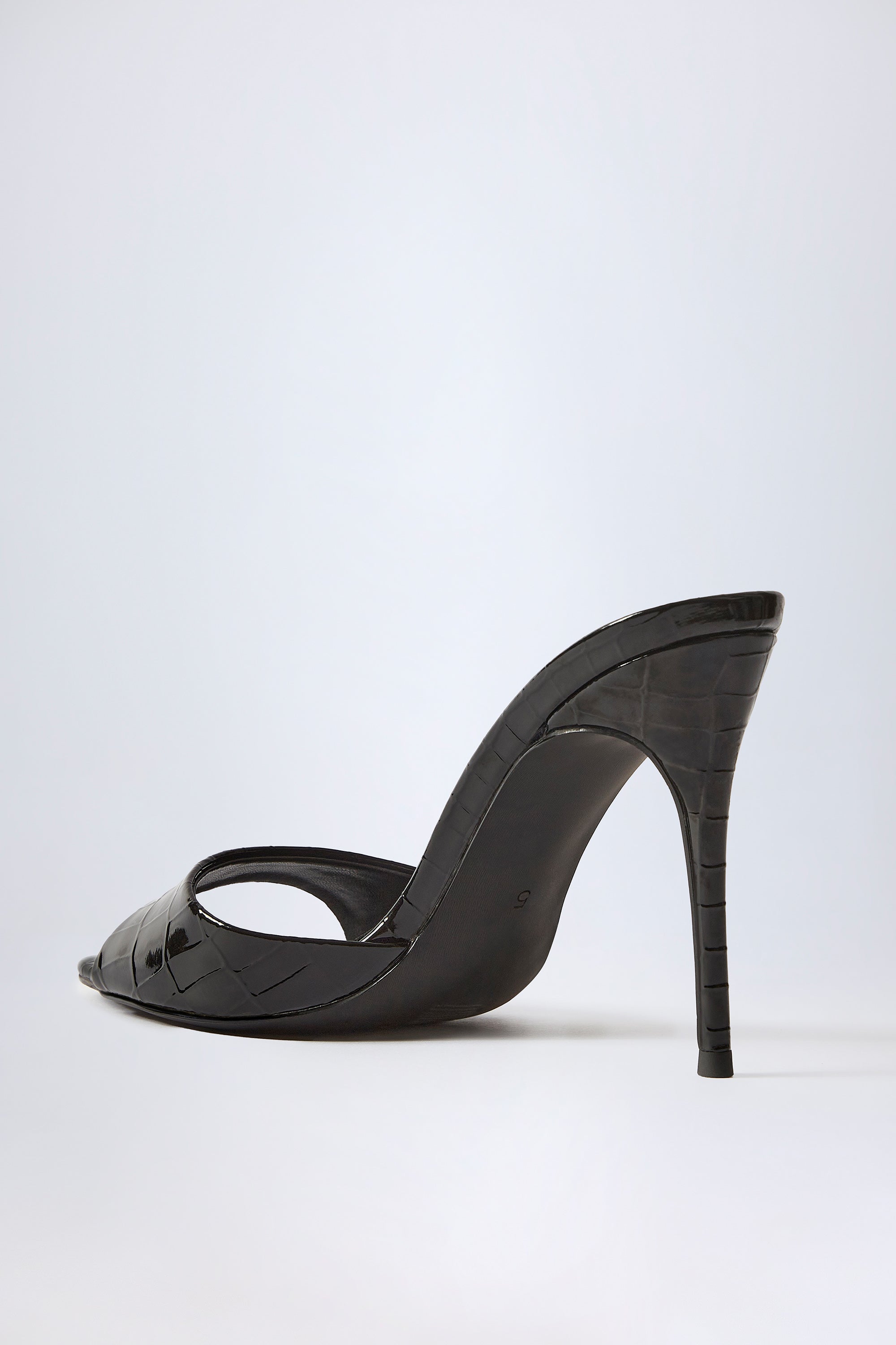 Almond-Toe Heeled Mules in Croc Patent Black