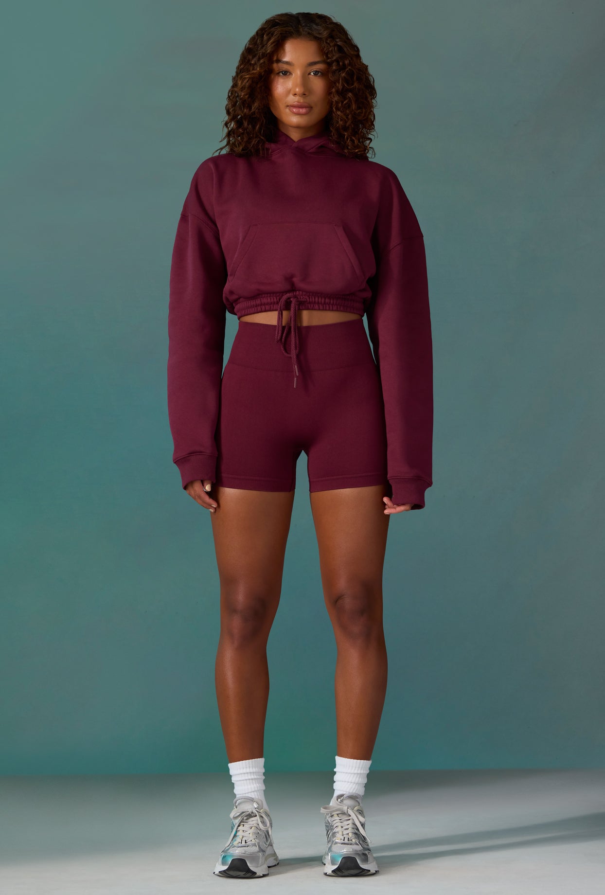 Cropped Drawstring Hooded Sweatshirt in Plum