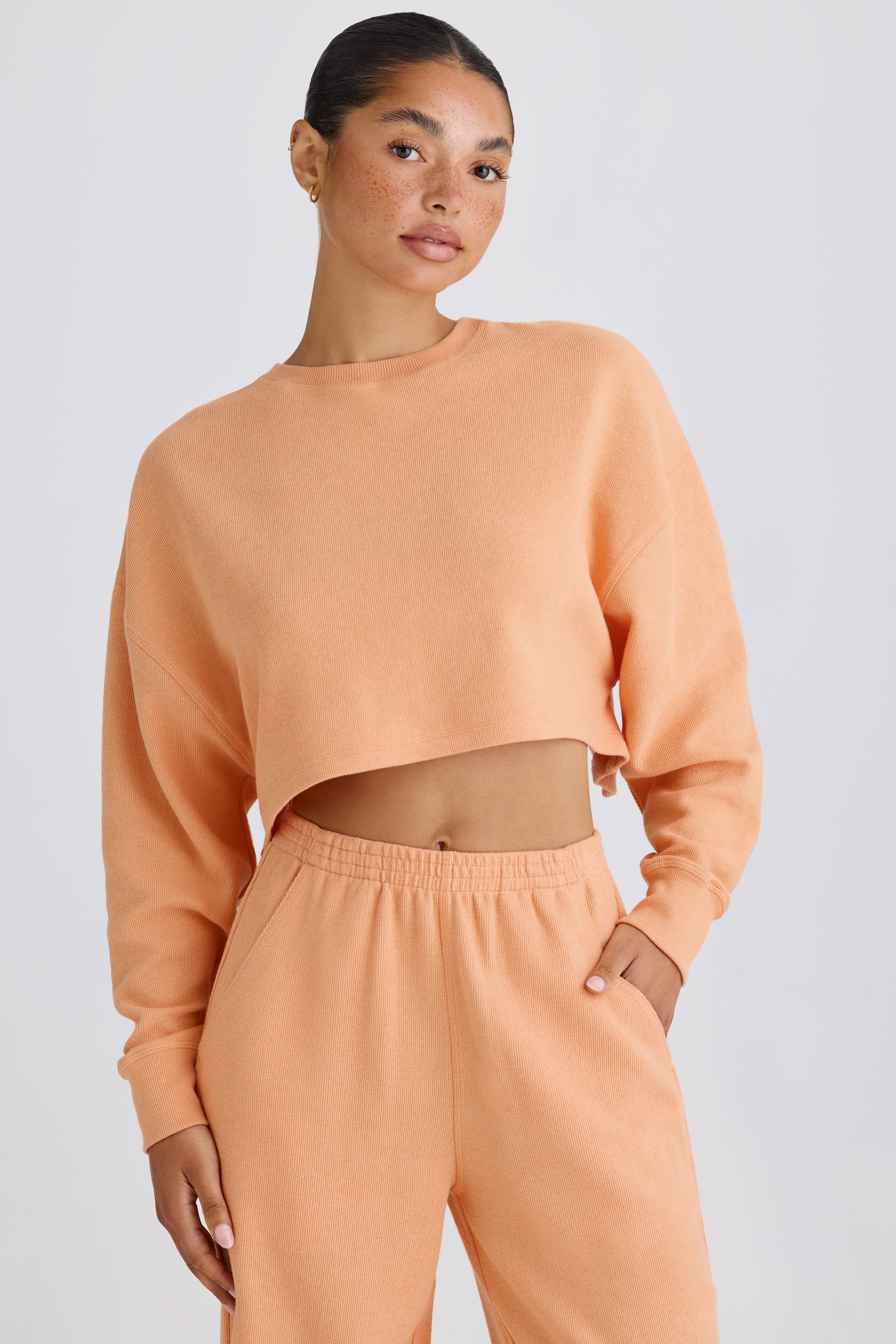 Crew-Neck Open-Back Cropped Sweatshirt in Peach