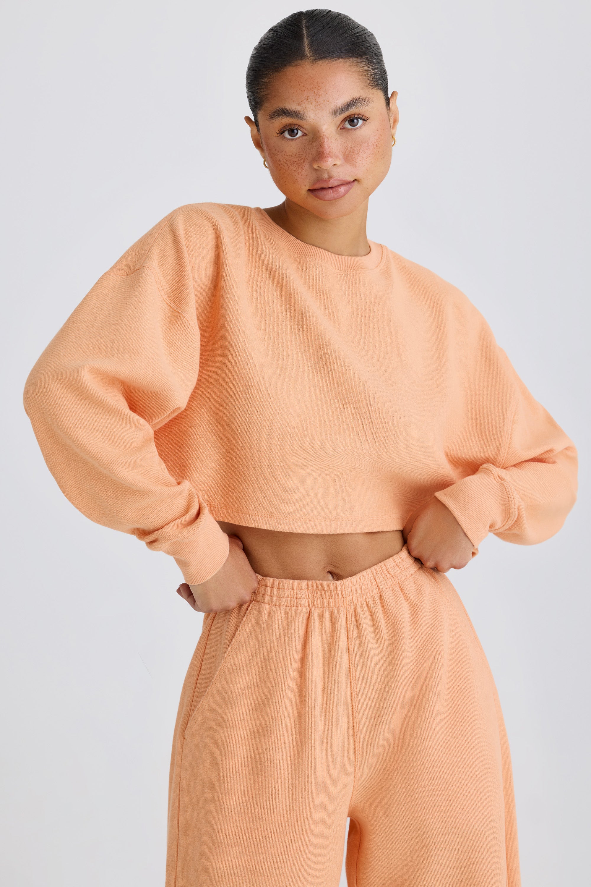 Crew-Neck Open-Back Cropped Sweatshirt in Peach