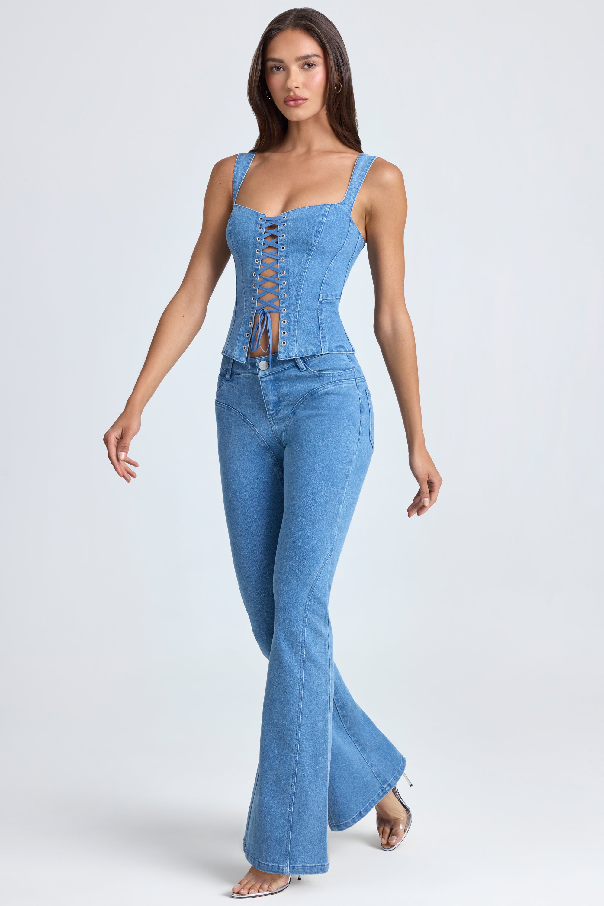 Petite Mid-Rise Flared Jeans in Mid Blue Stonewash