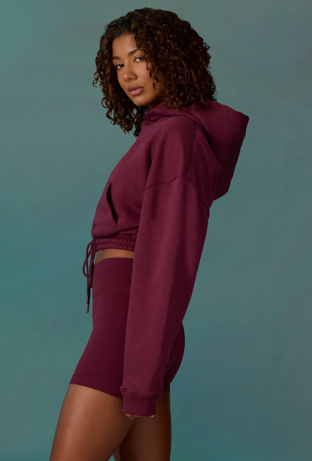 Cropped Drawstring Hooded Sweatshirt in Plum