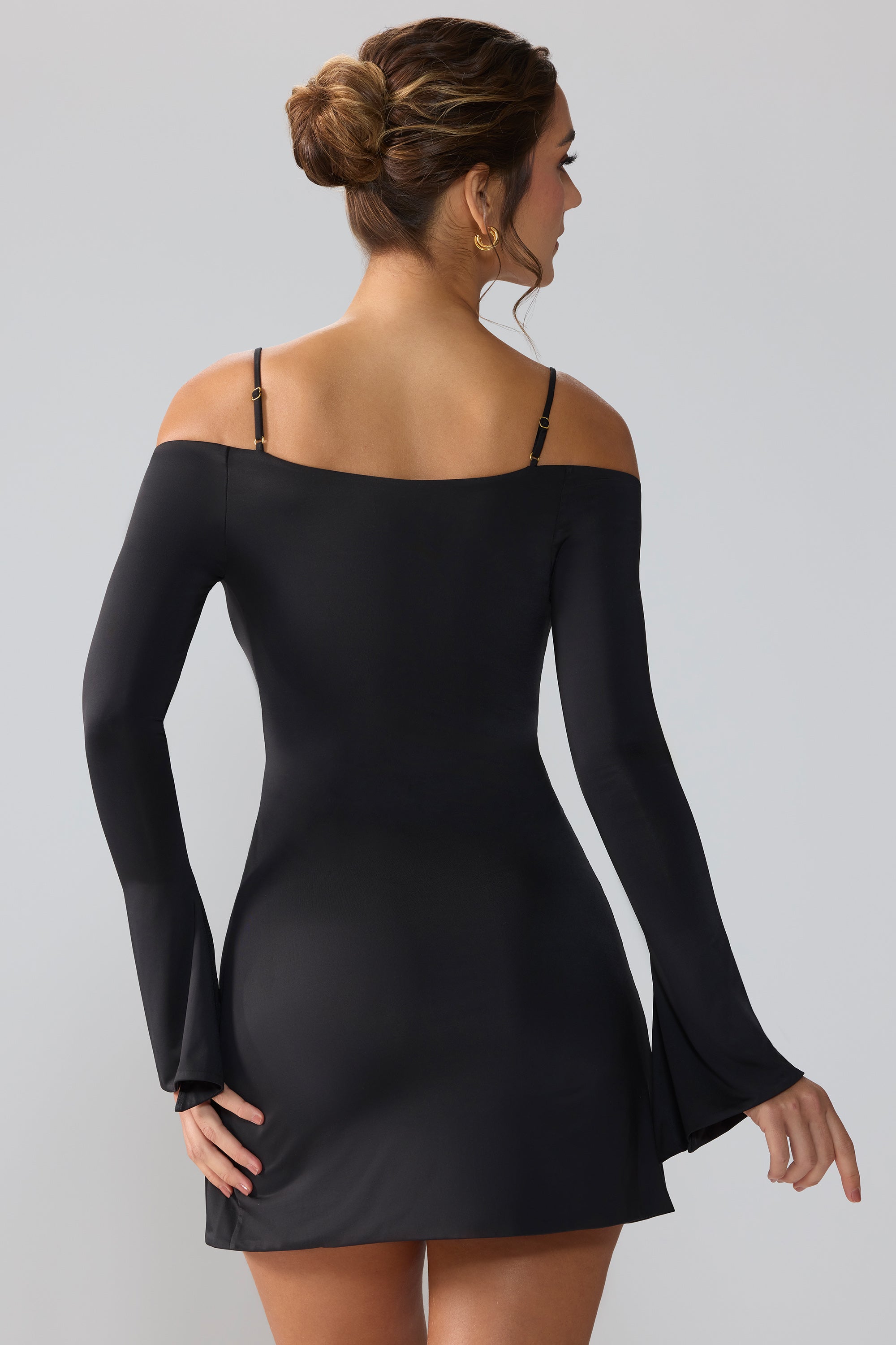 Slinky Jersey Long Sleeve Cut Out Mini Dress in Black