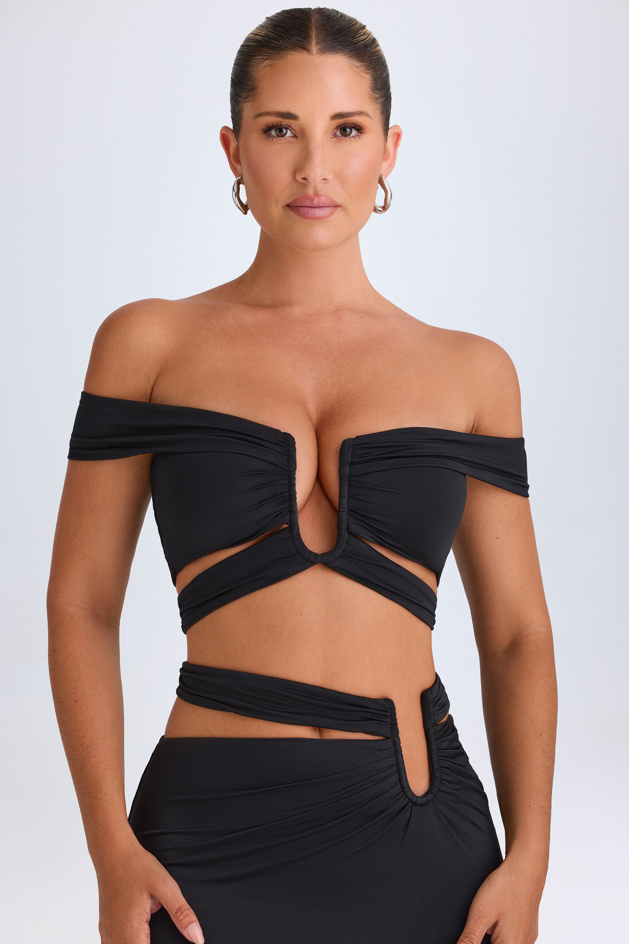 Cut-Out Off-Shoulder Crop Top in Black