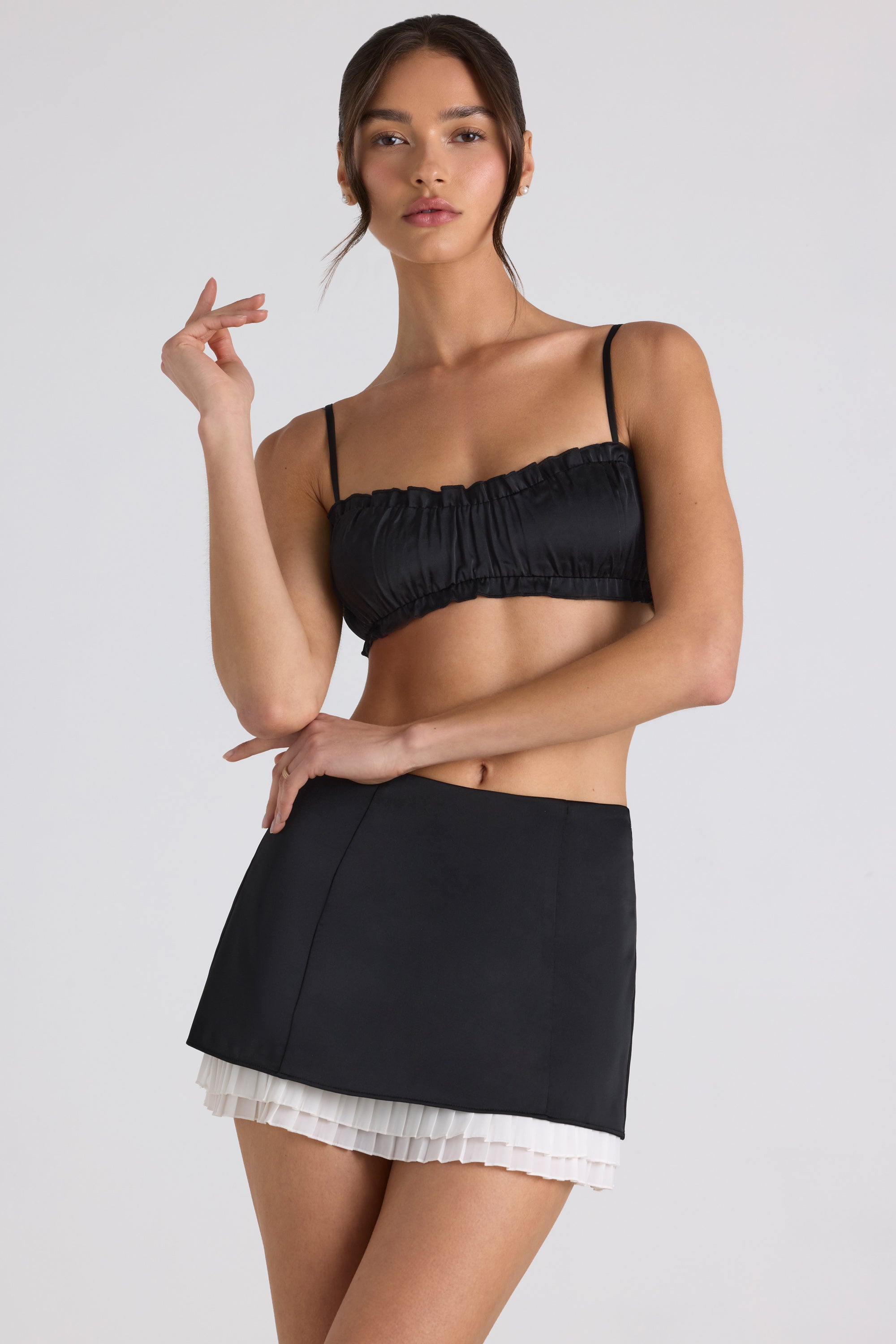 Ruffle-Trim Smocked Crop Top in Black