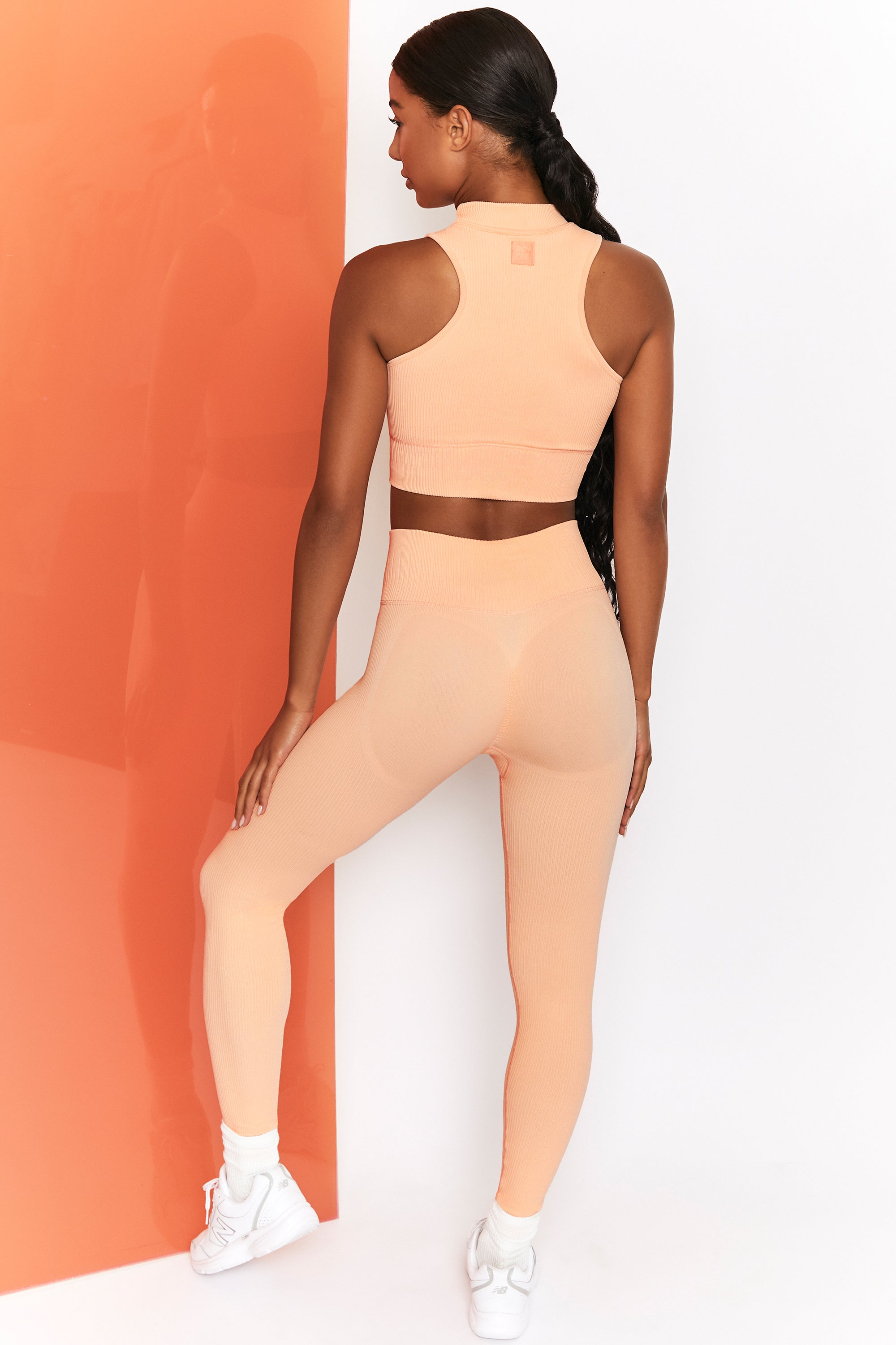 Miles Ahead Ribbed High Neck Crop Top in Peach