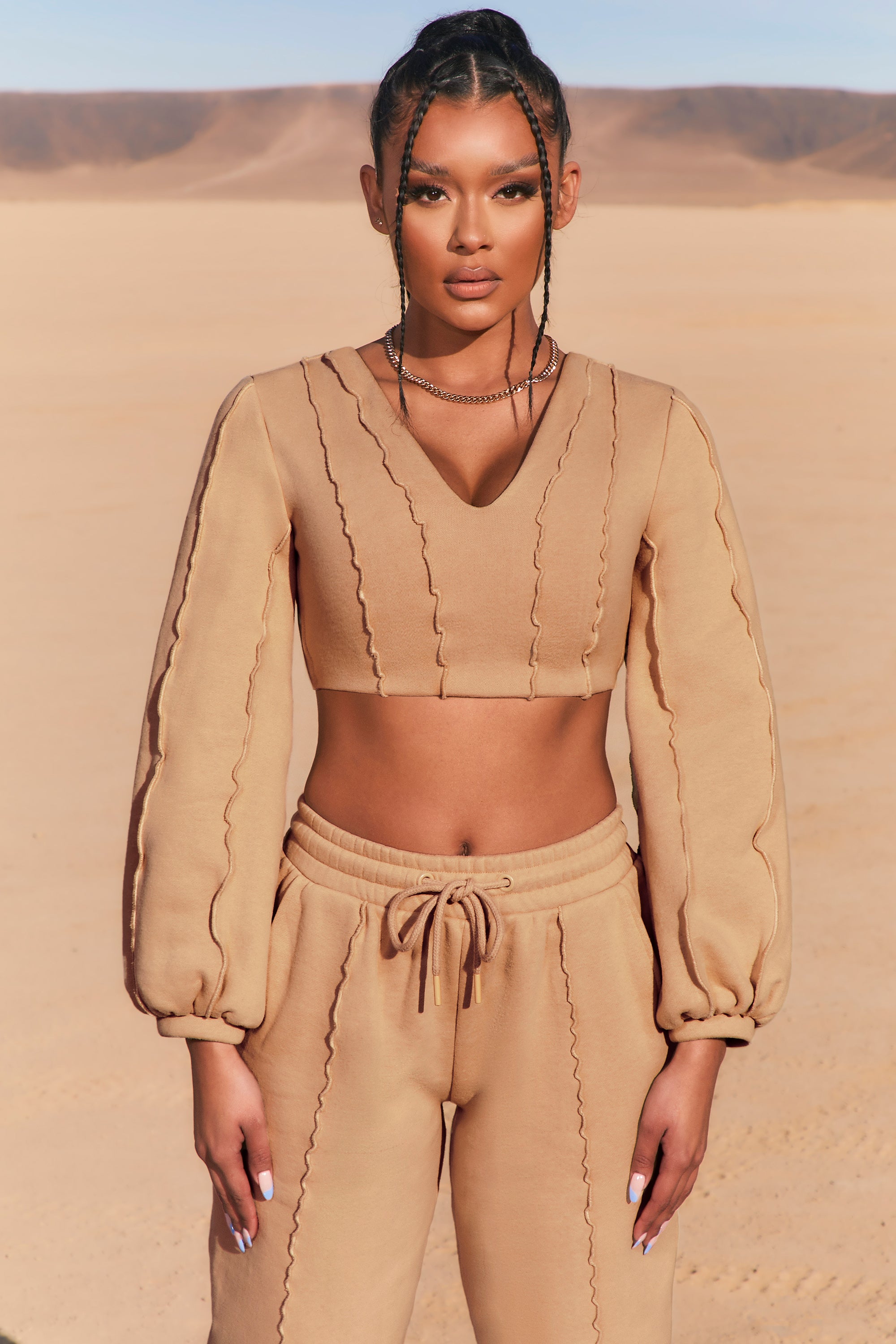 Uncovered Exposed Seam Bardot Crop Top in Beige